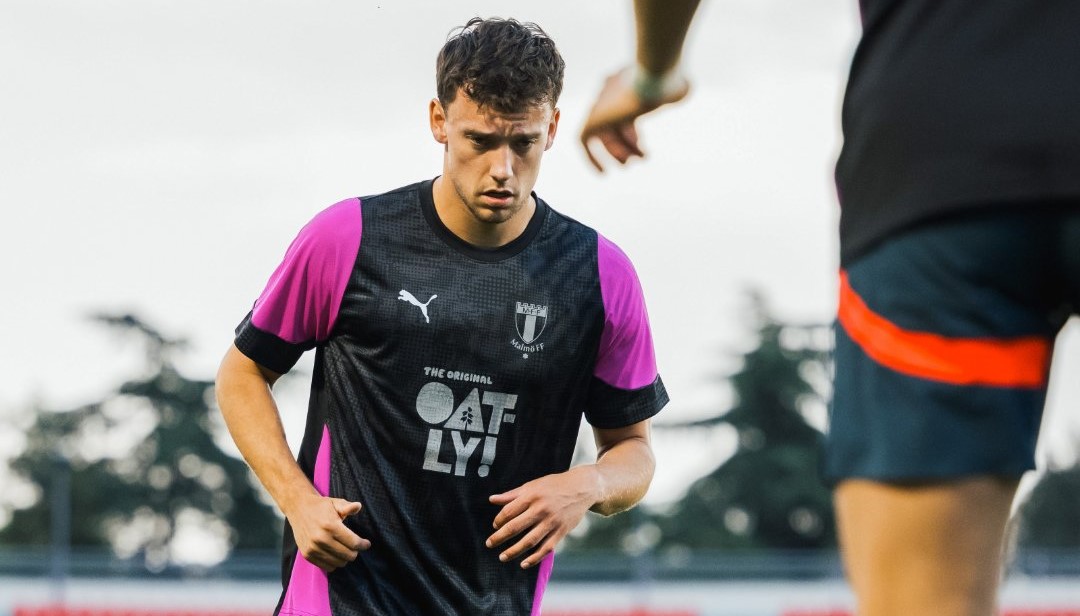 Jogadores do Malmo a aquecer